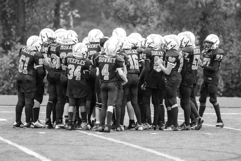 youth football huddle coach